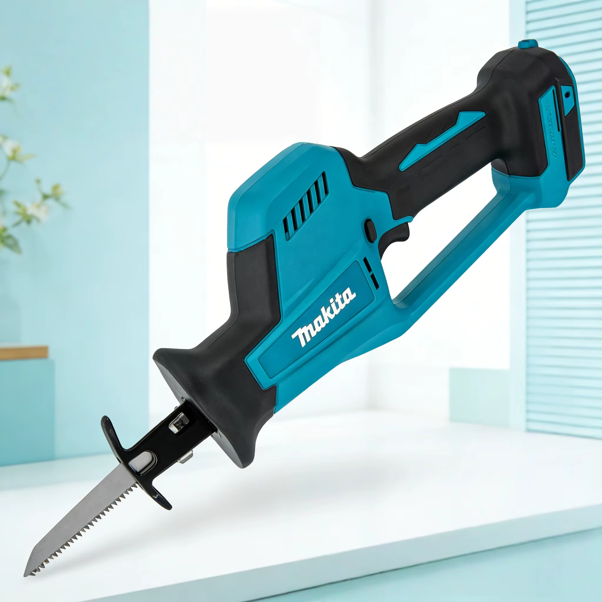 Scie à onglet portative Makita DJR189 18V sans fil