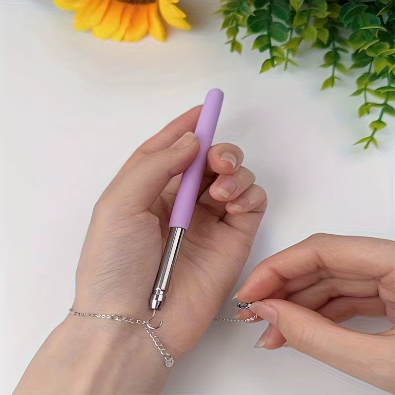 Outil d'aide à la pose de bracelets et bijoux