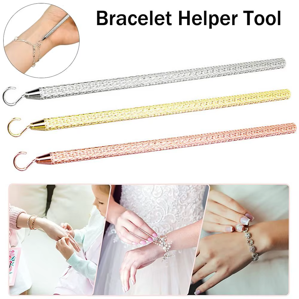 Outil d'aide à la fixation de bracelet à main